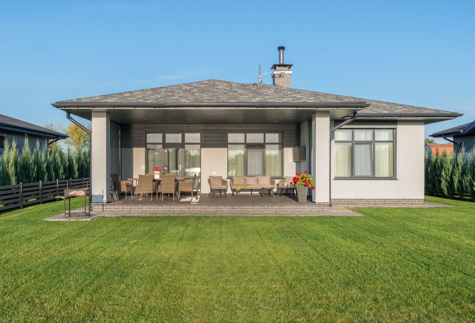 Covered patio running along the rear elevation of a single-storey house